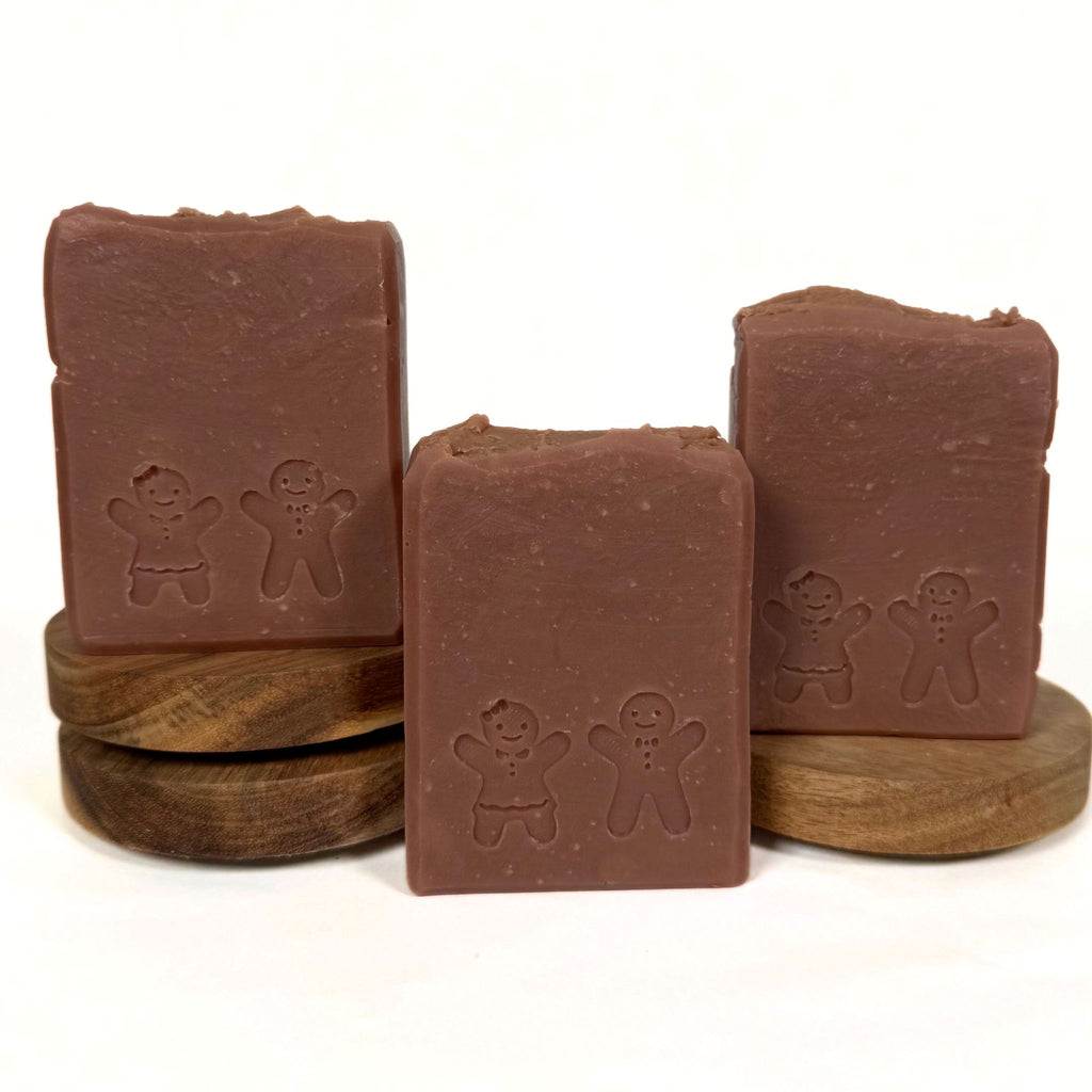 Handmade Gingerbread Christmas soap bar with festive gingerbread design by Artesana Soaps.