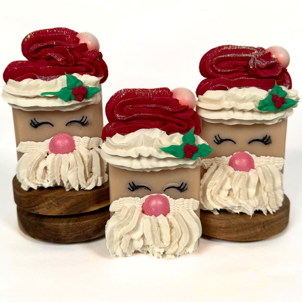 Oversized handmade Santa Claus Christmas soap bar in Jolly berry and tangerine scent by Artesana Soaps.